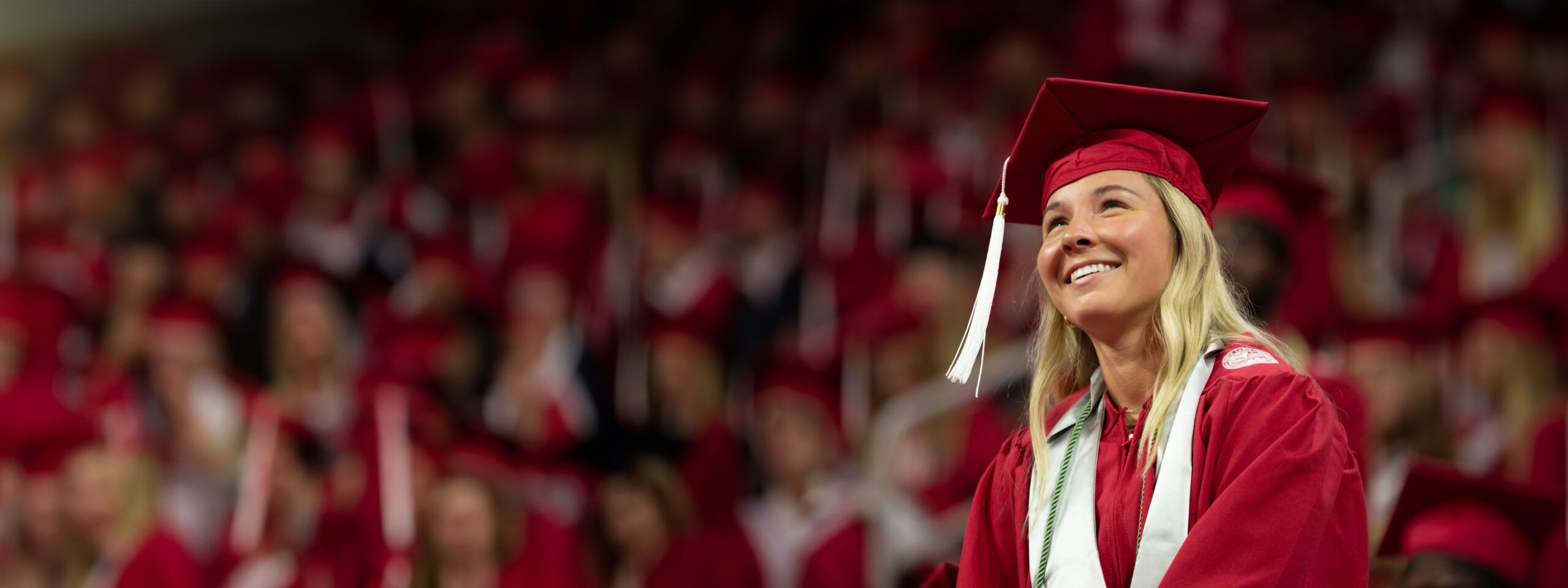 Undergraduate stands for recognition at Spring 2023 Commencement in PNC Arena.