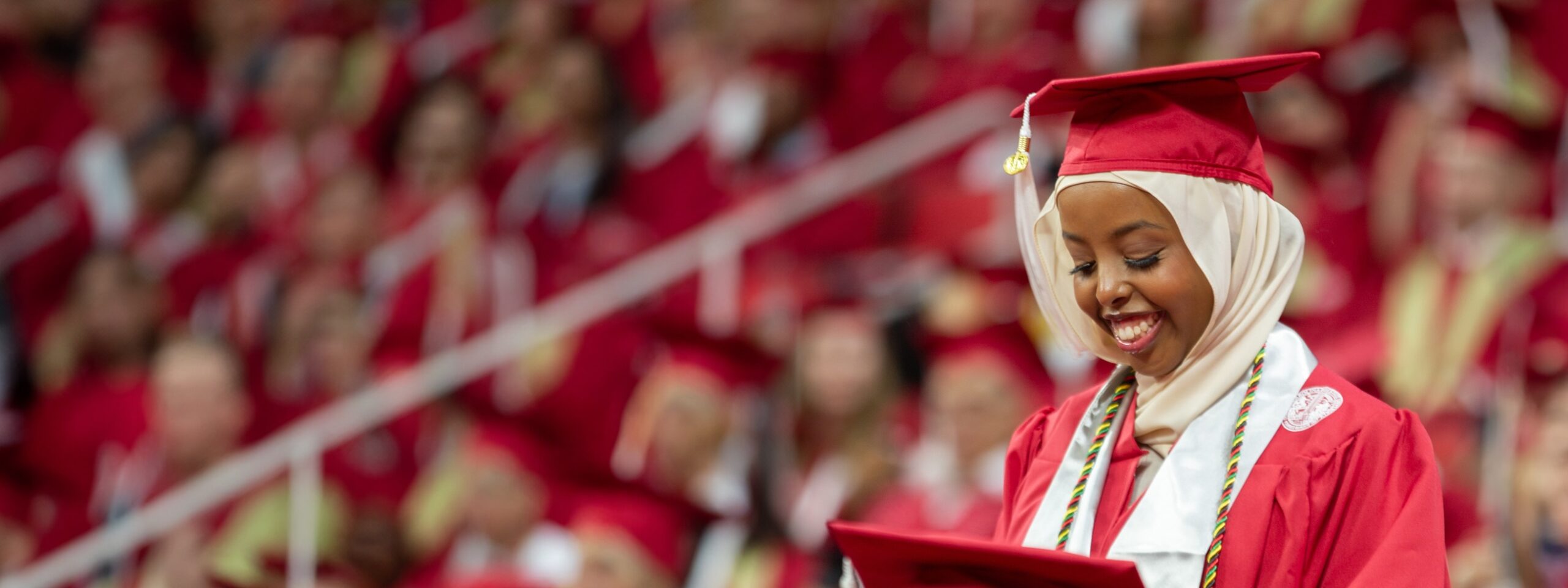 Undergraduate stands for recognition at Spring 2023 Commencement in PNC Arena.